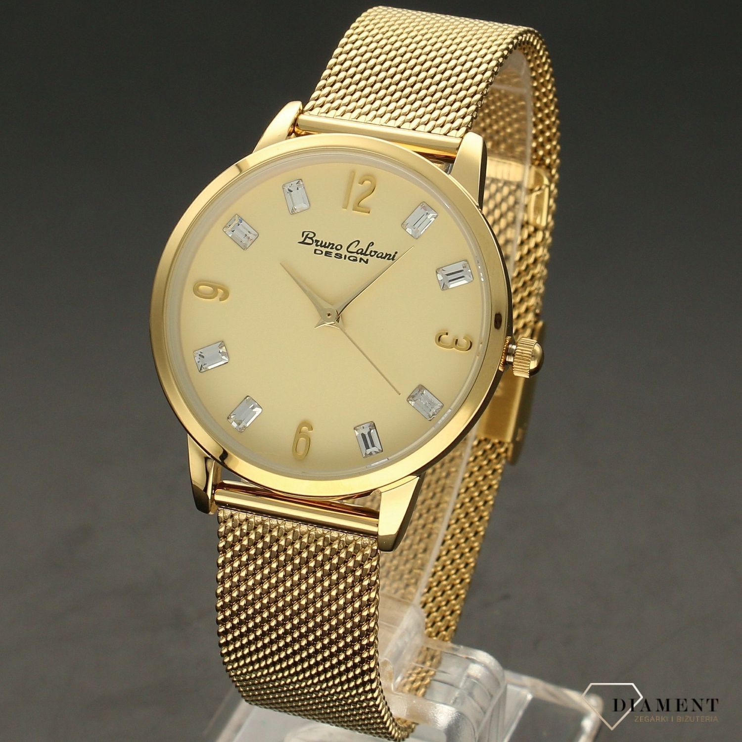 Zegarek damski BRUNO CALVANI złoty z kryształami BC90533 GOLD. Złoty zegarek damski z ozdobną tarczą. Indeksy w formie błyszczących kryształów. Zegarek damski ze stalową bransoletką typu mesh w kolorze złotym (4).jpg